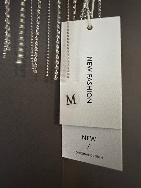 Pink shirt with fringe