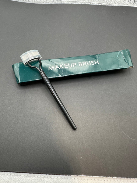 Eye lash comb
