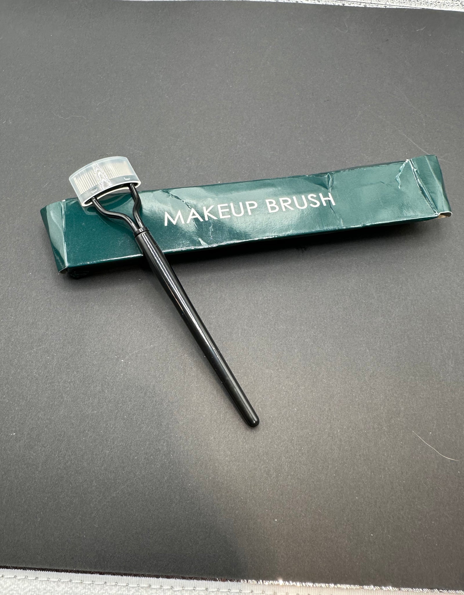 Eye lash comb