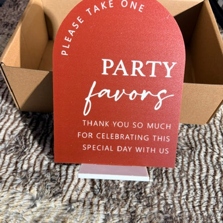 Party favors sign