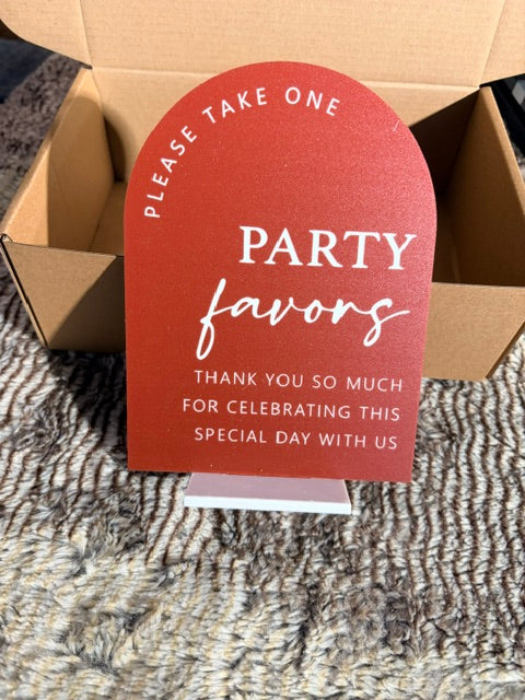 Party favors sign